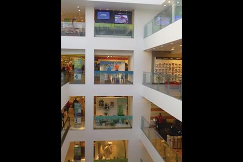 John Lewis’s colour in your spring theme brings greens and blues from windows to cash desks